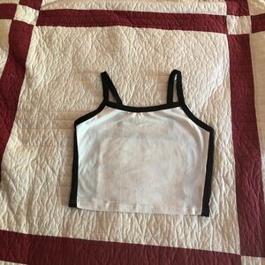 Women’s tank top. Black outline on white top.